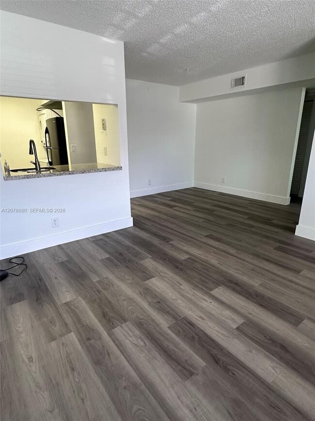 10049 Winding Lake Rd Unit 103