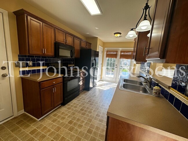Photo - Spacious 3 Bedroom Home with Primary Suite on Main, Gas Fireplace & Patio in Advance!