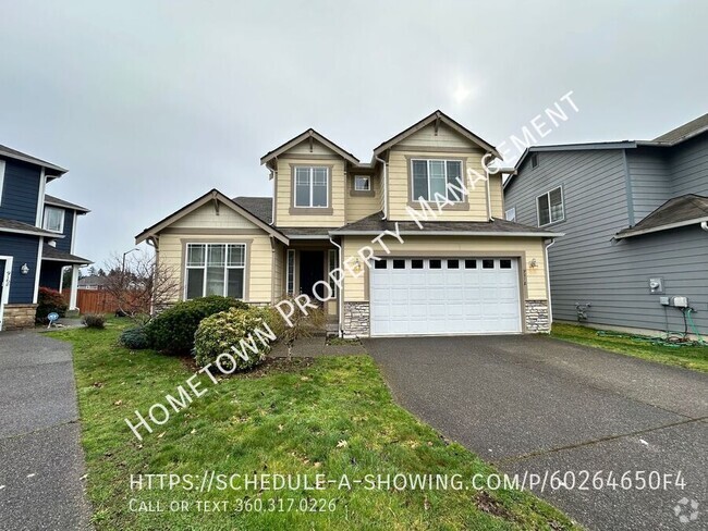 Building Photo - 4 bedroom 2.5 bath home Minutes to JBLM - ...