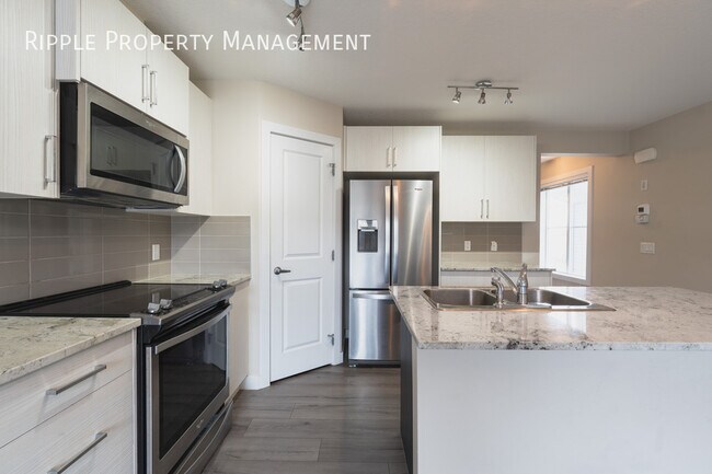 Photo - STUNNING 2 BEDS + DEN, 2.5 BATHS TOWN HOUSE | MODERN SAGE HILL LIVING