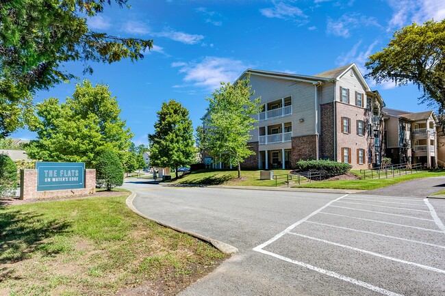 Entrance - The Flats on Waters Edge Apartments