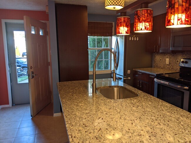 Renovated kitchen and HUGE island with seating for 8!