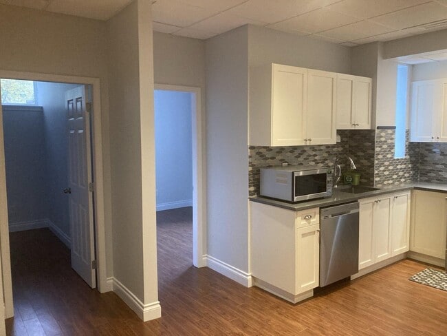 Photo - 13520-1355A 55 A Ave Unit BSMT