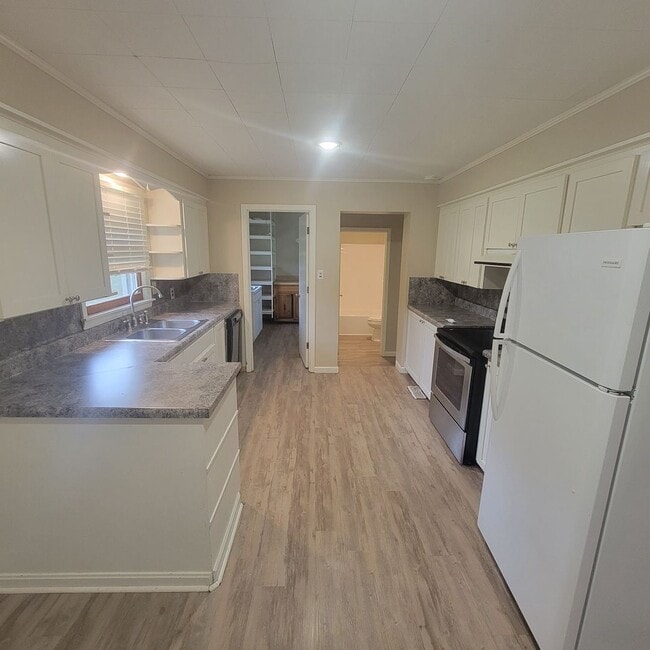 Photo - 4 Bedroom, 2 Bathroom Single Family Home-$...