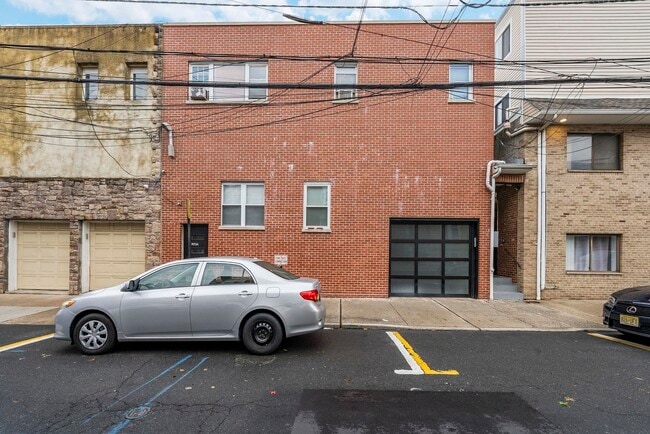 Building Photo - 7013 Polk St Unit 2