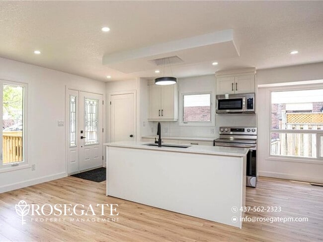 Photo - Spacious 3-Bedroom Main-Level Apartment with Front Porch & Parking in London Unit 1