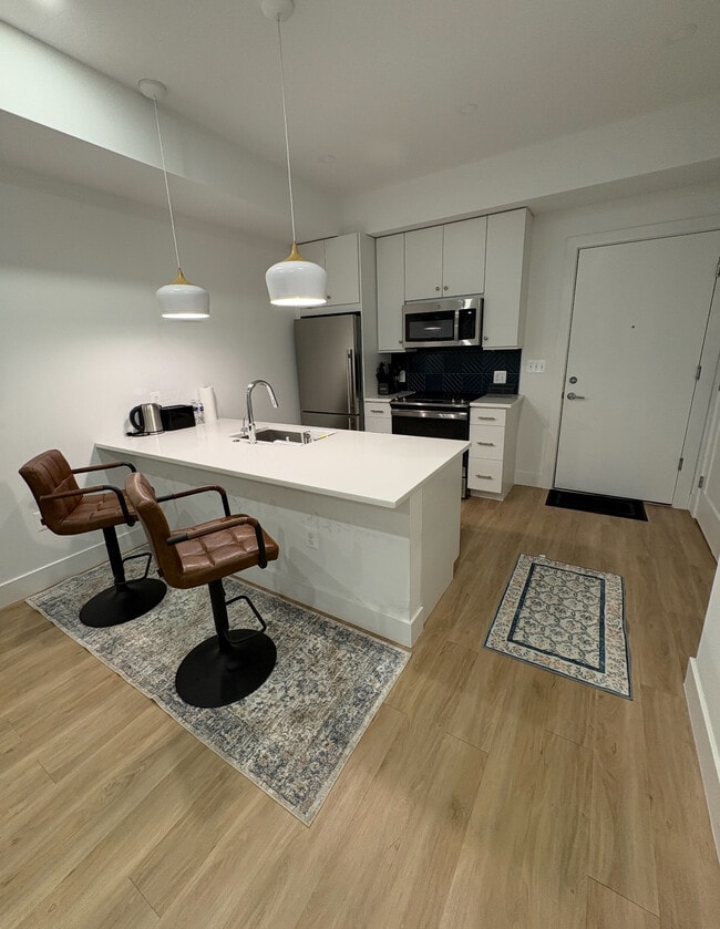 Photo - 2310 4th St NE Unit The Road