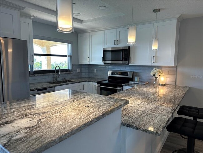 Photo - 12500 Capri Cir N Unit 401