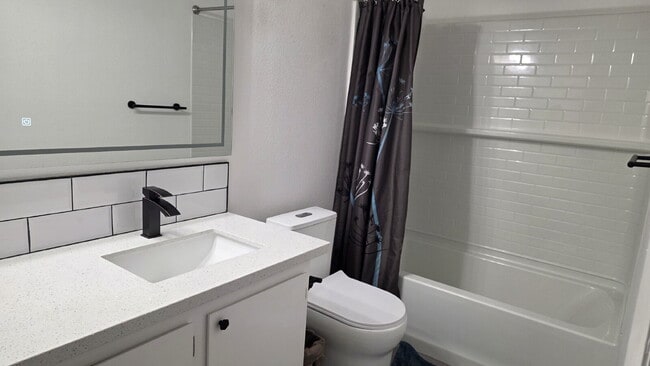 Photo - Beautifully remodeled pool home situated on a spacious quarter-acre lot