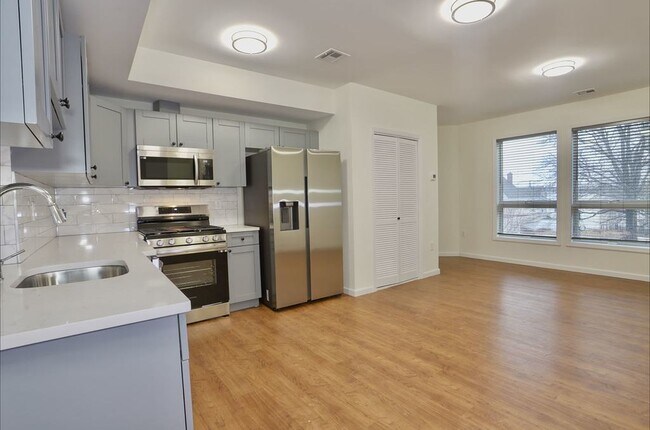 Kitchen view towards living room - 143 Zabriskie St