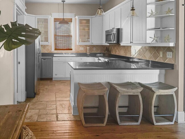 Photo - 50% off first months rent.  Open 3 bedroom...