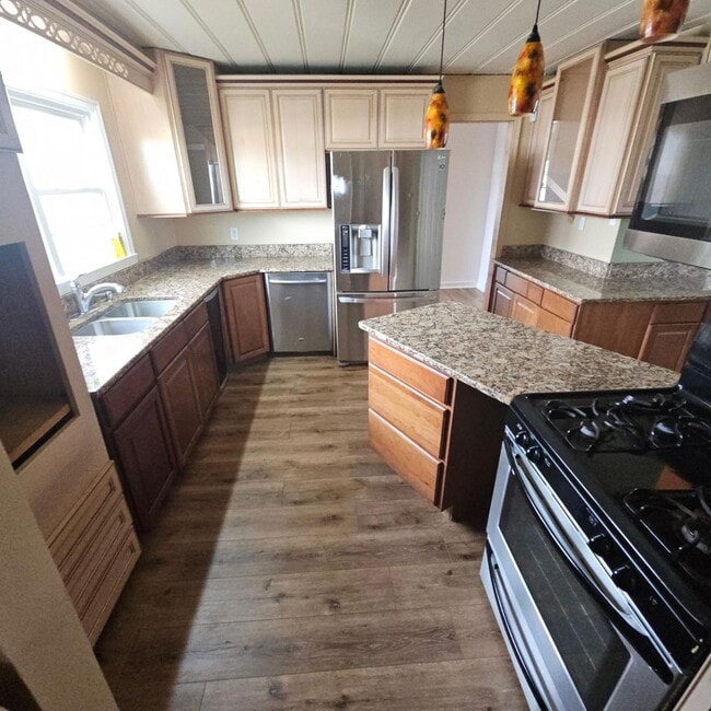 Photo - Elegant 5-Bedroom, 4-Bath Home with Expansive Living Spaces