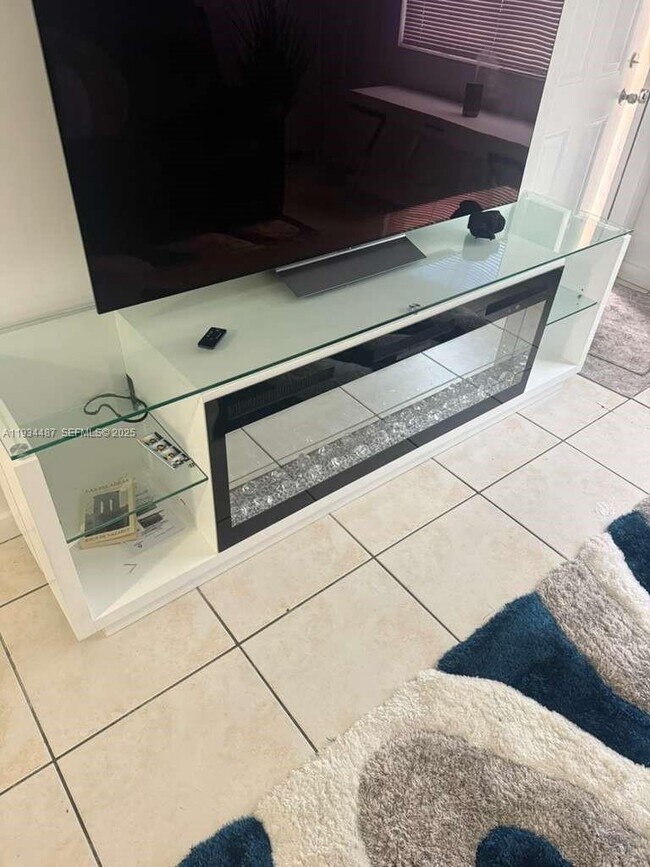 Building Photo - 1250 SE 26th St Unit 102