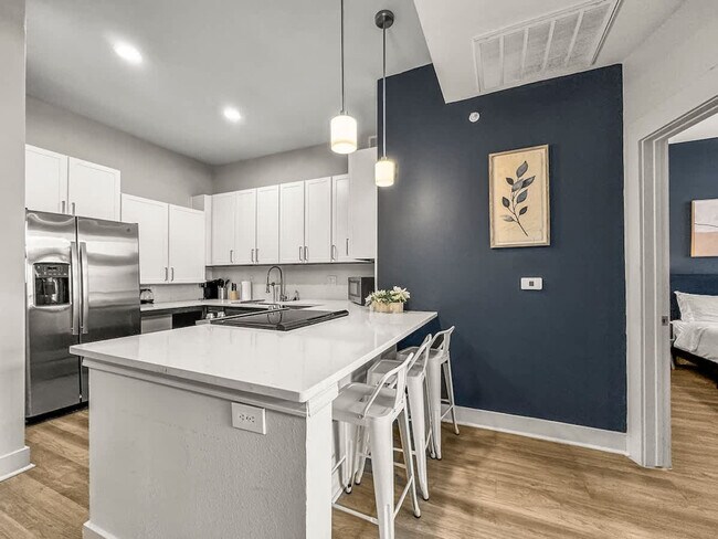 Photo - 310 N Malcolm X Blvd Unidad ID1075574P