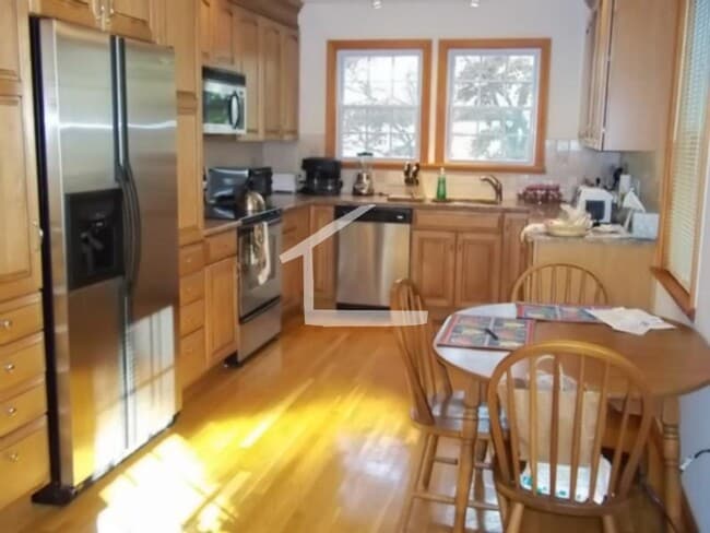 Photo - Single-Family House, Garage Parking, Central Heat/AC, In-Unit Washer and Dryer