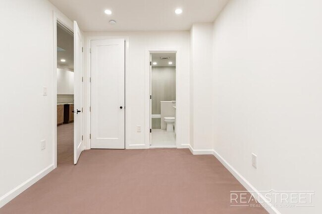Photo - Spacious 2-Bedroom, 2-Bath Apartment in Bed-Stuy with Modern Amenities