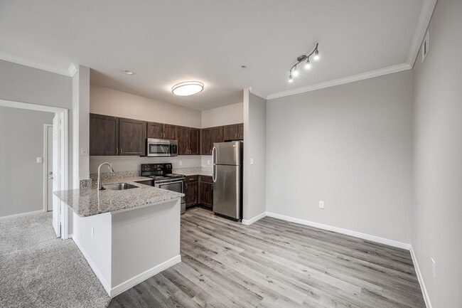 2BD, 2BA - 994SF - Kitchen and Dining Area