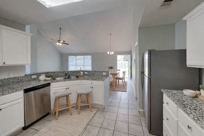 Photo - Beautiful 4BR Home in Denton with Fireplace, Fenced Yard & Garage