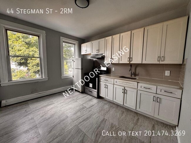 Building Photo - 44 Stegman St Unit 2RM