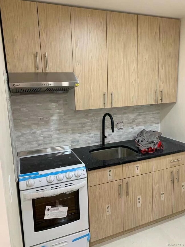 Photo - 66-35 Grand Ave Unit 2F