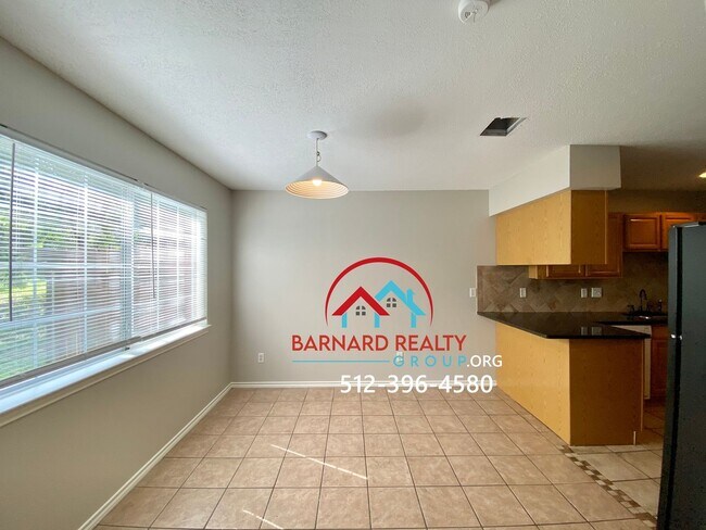 Photo - Available July 11: 3 bedroom, 2.5 Bath Duplex with Garage and Fenced Yard