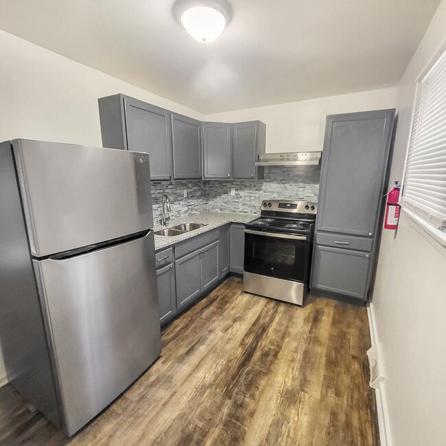 Building Photo - 603 W 4th St Unit Apt 2