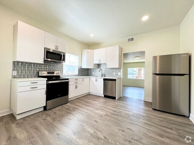 Building Photo - Now showing 3BR 2 full Bath house with lar...