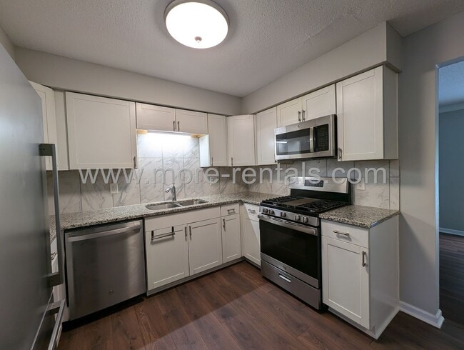 Photo - Remodeled house with garage