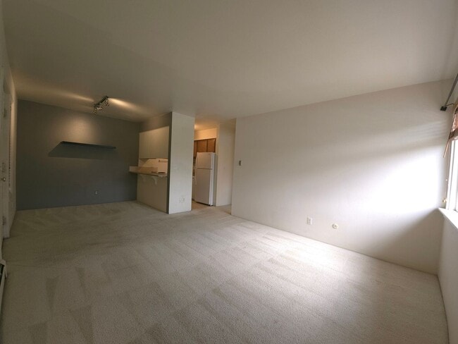 Photo - Elevated Living: Top-Floor 1 Bedroom Apartment with Mountain Views for a Serene and Scenic Lifestyle Unit 13