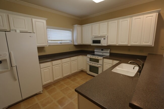 Photo - EXECUTE LIVING IN PRIVATE COMMUNITY