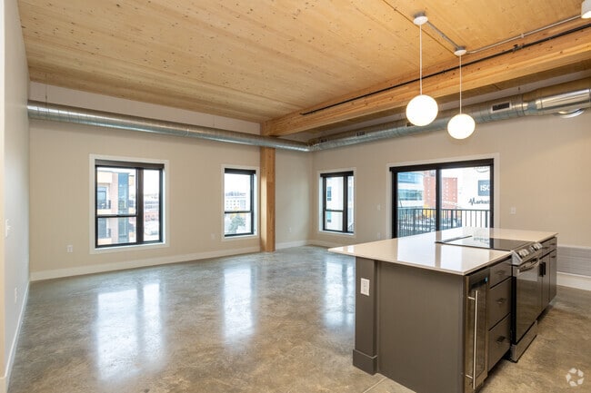 2BR, 2BA - 1,247SF - Dining Room/Living Room - The Clark Lofts at Cherapa Place