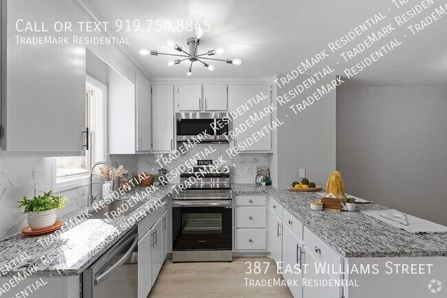 Building Photo - Gorgeous, Newly Renovated Townhome