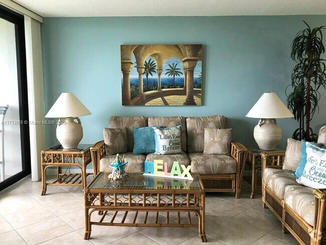Building Photo - 9940 S Ocean Dr Unit 104 Rental