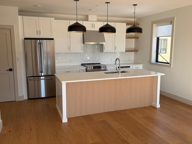 Building Photo - 1025 Massachusetts Ave Unit 302