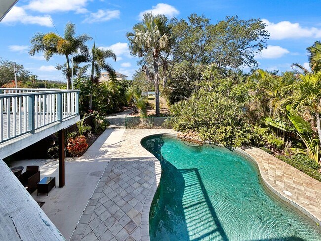 Photo - 4 Bed Waterfront Paradise with Pool, Dock & Gulf Access in Baileys Bluff