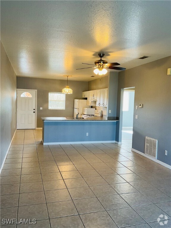 Building Photo - 1117 SW 48th Terrace Unit 4 Rental