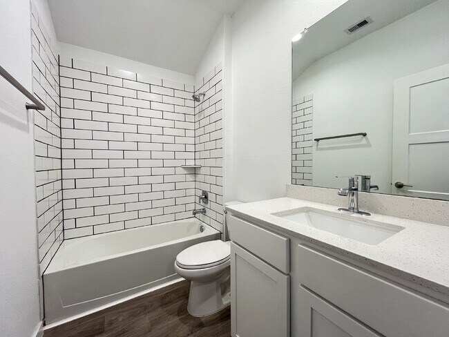 Photo - Modern 4-Bed Home with Office in Fosters Ridge Near The Woodlands | Open Layout & Resort-Style Am...