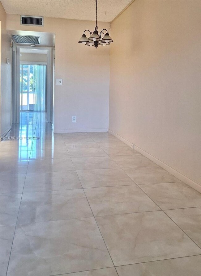 Photo - 400 SW 134th Way Unit 107F