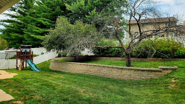 Photo - "Charming 3-Bed Oasis with 2.5 Baths on Carrington Court!"