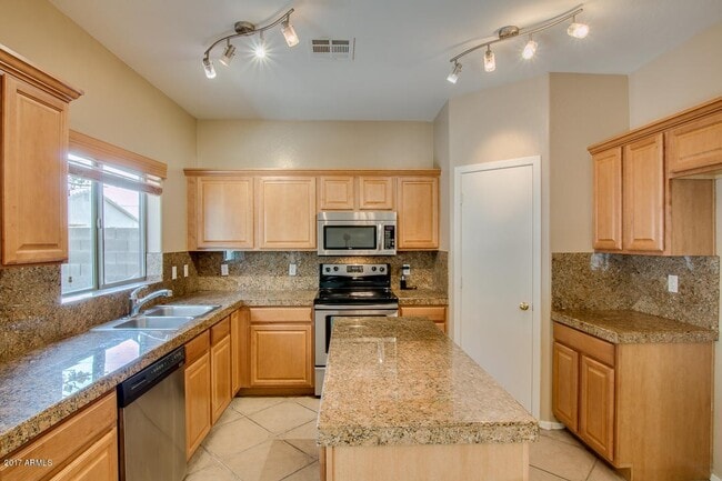Photo - Beautiful five bedroom, 2.5 bath home with a large loft in the San Tan Heights community.