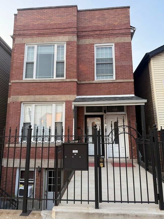 Building Photo - 1816 W 23rd St Rental