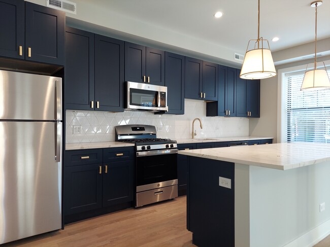 Building Photo - 4409 N Seeley Ave Unit 1A