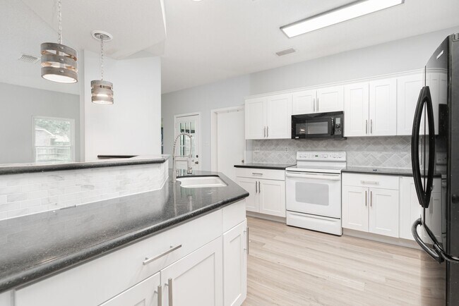 Photo - Beautiful corner lot move in ready!