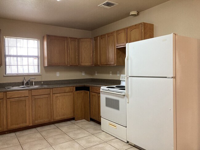 Updated 2 Bedroom Home with Bonus Room and Covered Patio