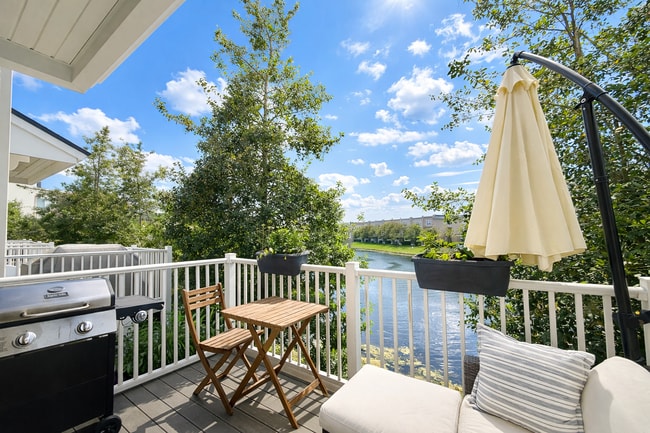 Outdoor patio area with water fountain views - 4428 Ellipse Dr