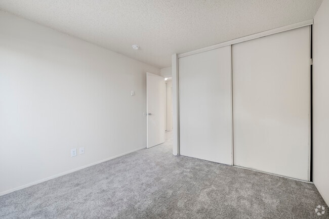 The B1.3 - 2BR, 1BA - 910SF - Primary Bedroom