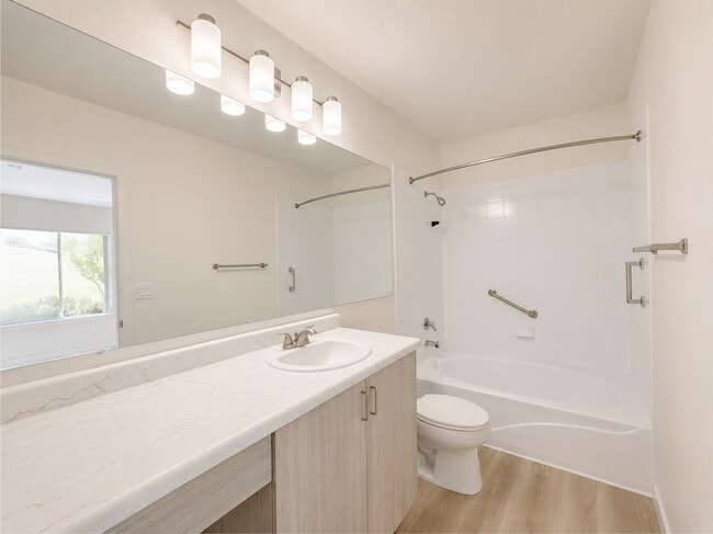 Renovated: Italian cabinetry and bright bathroom lighting. 5601 Taylor Ranch Rd NW, Albuquerque