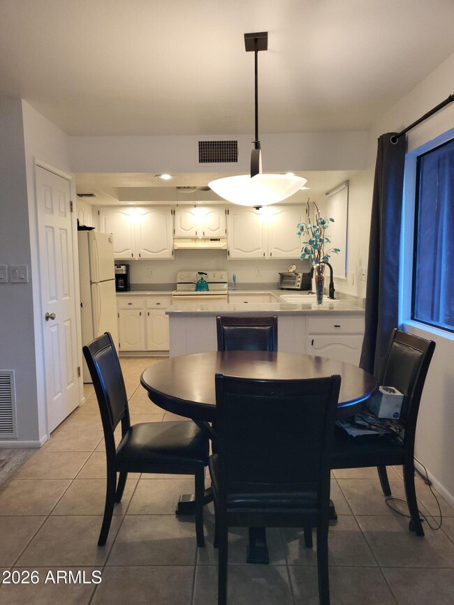 Building Photo - 12222 N Paradise Vlg Pkwy S Unit 103