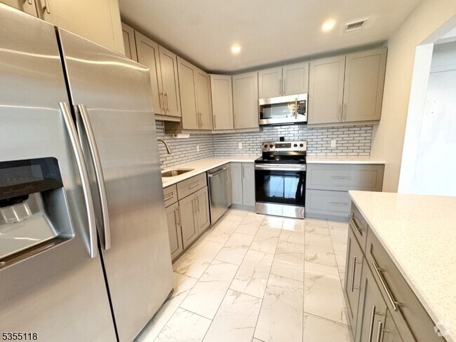 Building Photo - 466 Pompton Ave Unit D Rental