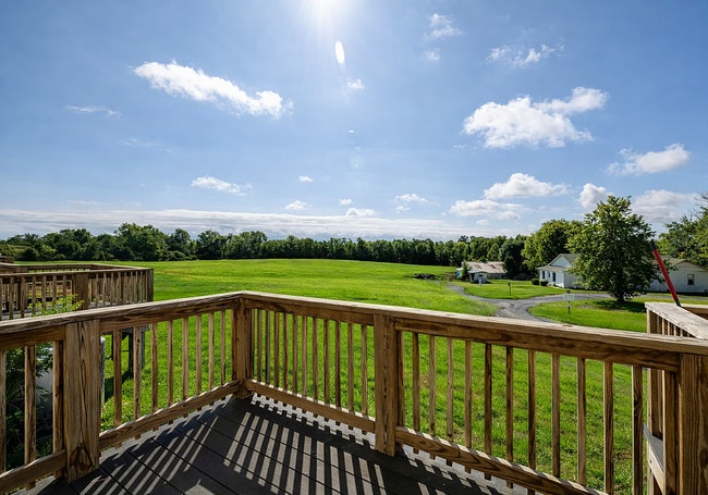 Serene countryside view from deck